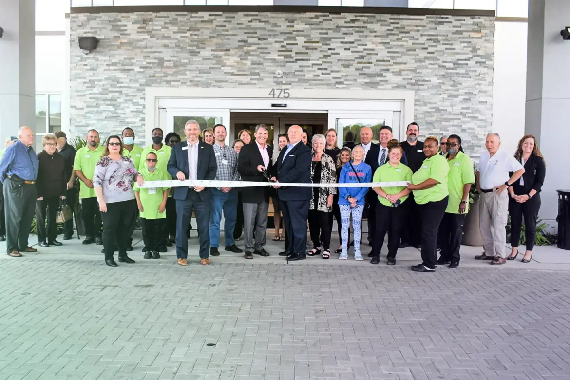 Ribbon cutting ceremony for the grand opening of a Newport Hospitality Group property, a Live Oak® small business bank customer